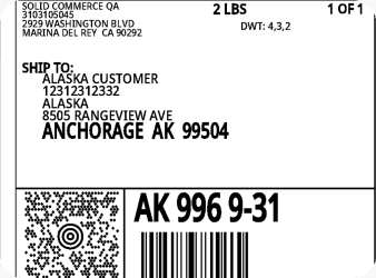 Printed shipping label close-up with tracking barcode and delivery address.